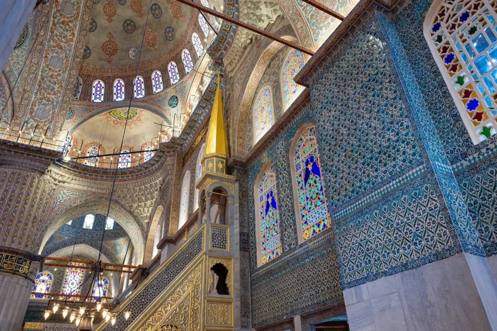 Ornate tiled interior and gilded minbar of the Blue Mosque (Sultan Ahmed Mosque), Istanbul