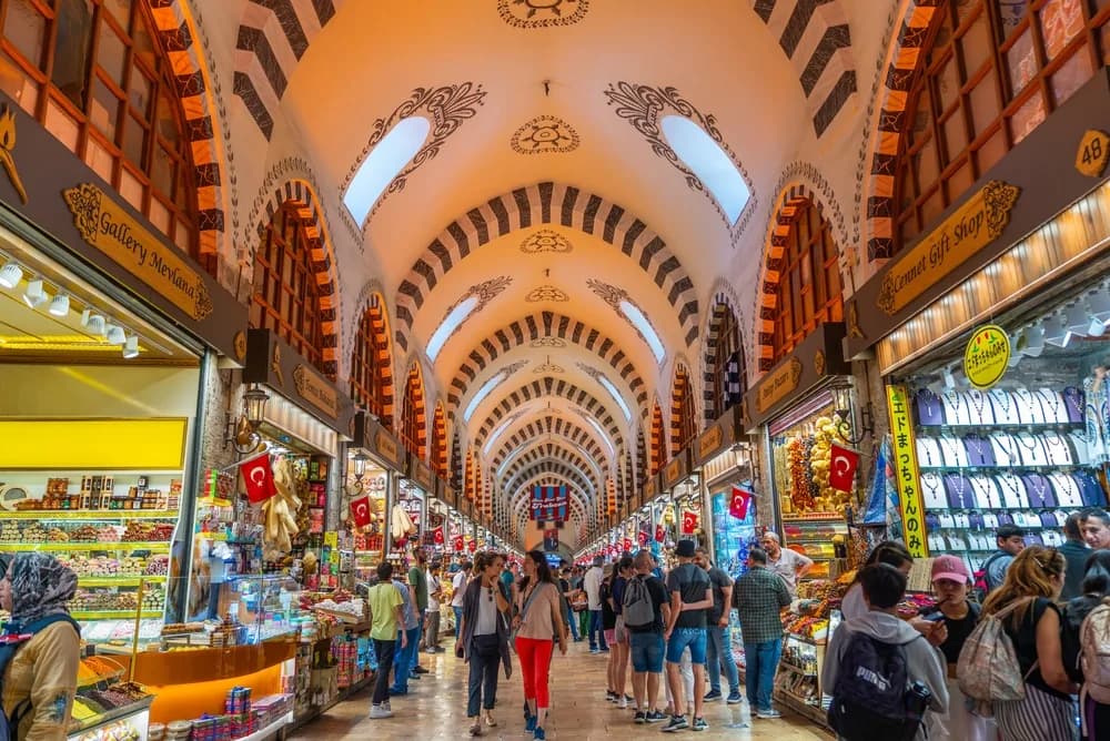 Vaulted arcade of the Spice Bazaar (Egyptian Bazaar) crowded with shoppers, Istanbul