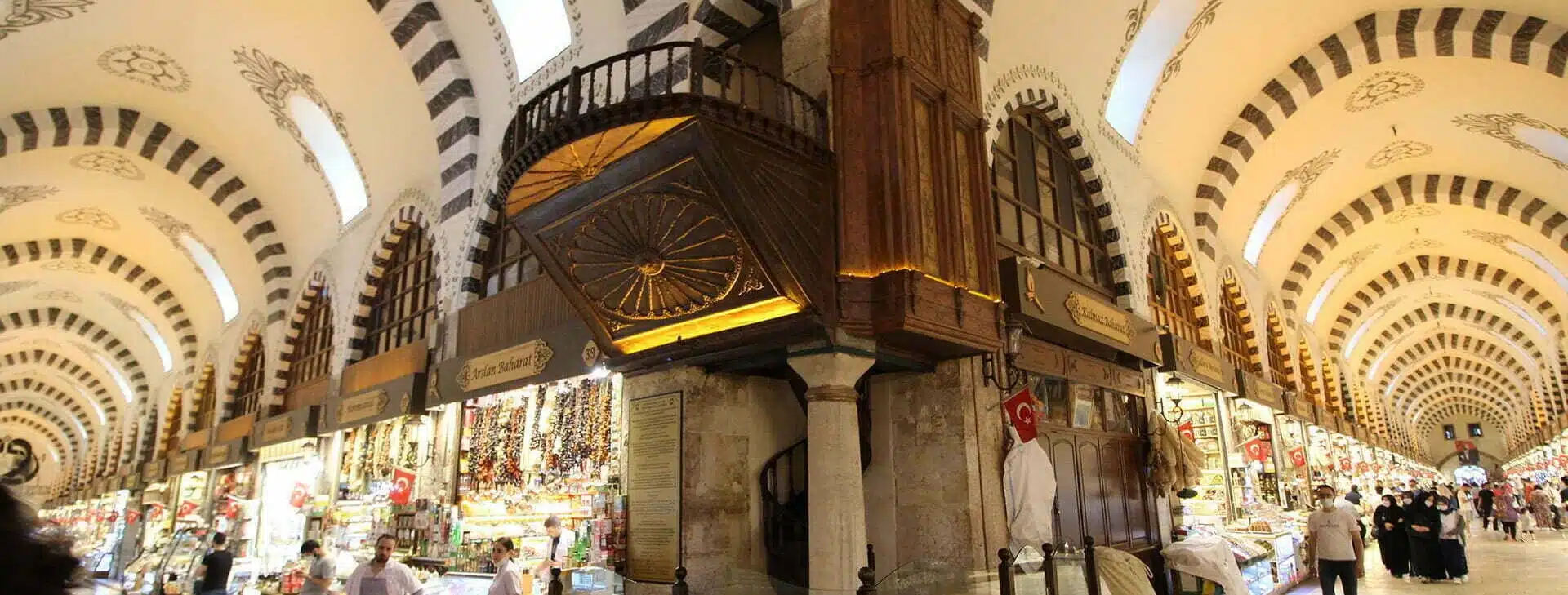 a building with a balcony and a store